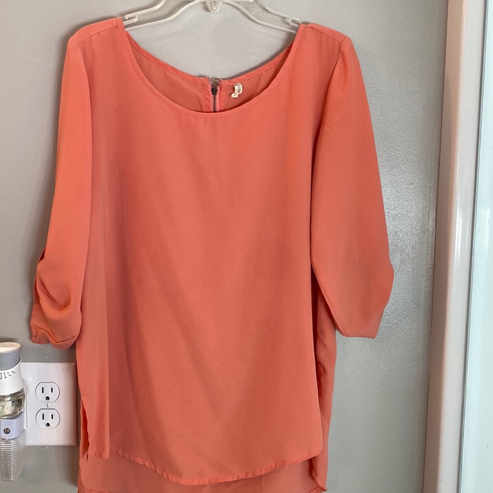 Japna size small peach blouse.